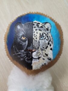 Hochet Panthère noire et Panthère des neiges